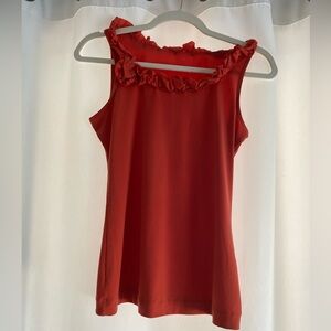 Orange sleeveless blouse